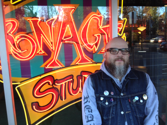 Jim Honey is the manager at Iron Age tattoo parlor in University City.