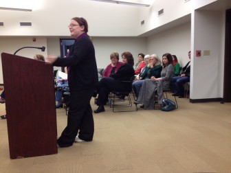Cherry Street resident Jennifer Brown tells the city council about speeders on Cherry.