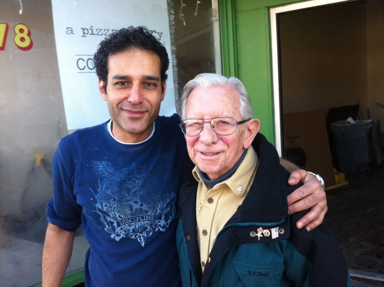 Muhammad Alhawagri (left) met Eddie Pilla outside A Pizza Story.