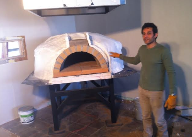 Restaurant owner will cook pizza in oven like his grandmother used