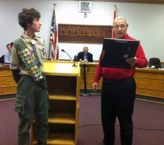 Brentwood Eagle Eagle Scout Joey Musial is recognized at a board of aldermen meeting.