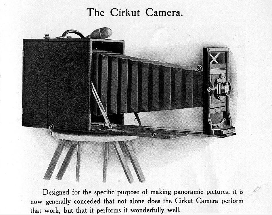 This image I pulled from a reproduced manual I found on the internet.  this is very likely the kind of camera that made the image.  it contained a clockwork mechanism that when wound and released using a gear in the top of the tripod simultaneously rotated the entire camera and as it wound the roll of film past the aperture.  the result was amazingly sharp photos.