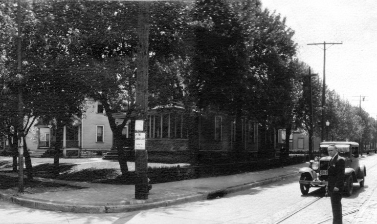 the sixth section affords a view long usneen of the homes that once occupied the space where an apartment building now stands.  I suspect the well dressed gentleman in the middle of the street is the photographer.  