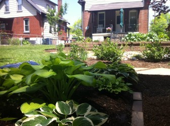This is one of the backyards on the tour, featuring a raingarden and chickens.