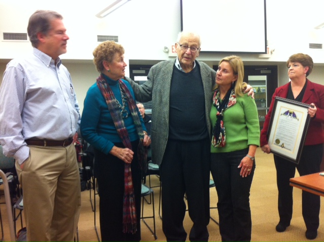 Isaac Young comments after receiving recognition from the Maplewood City Council. (Left to right: David,, son; Marilyn, wife; Young; Jodie, daughter-in-law; Karen Wood, council member