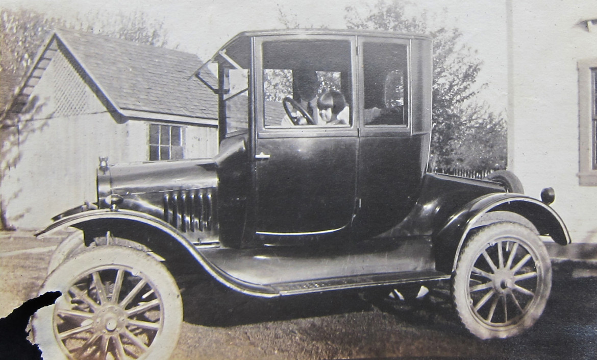Let's start with one of my favorites, the family car.  I believe Marjorie is at the wheel with her father, albert beside her.  She was born in 1918 so that should give us an idea of the year of this photo.  1920?  The location is unknown.