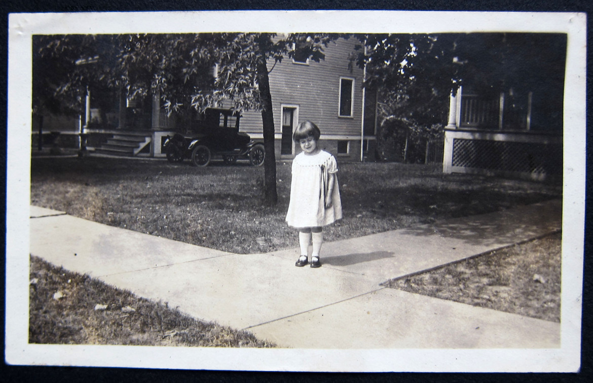 Here's Marjorie in front of their home at 2855 Laclede Station Road.