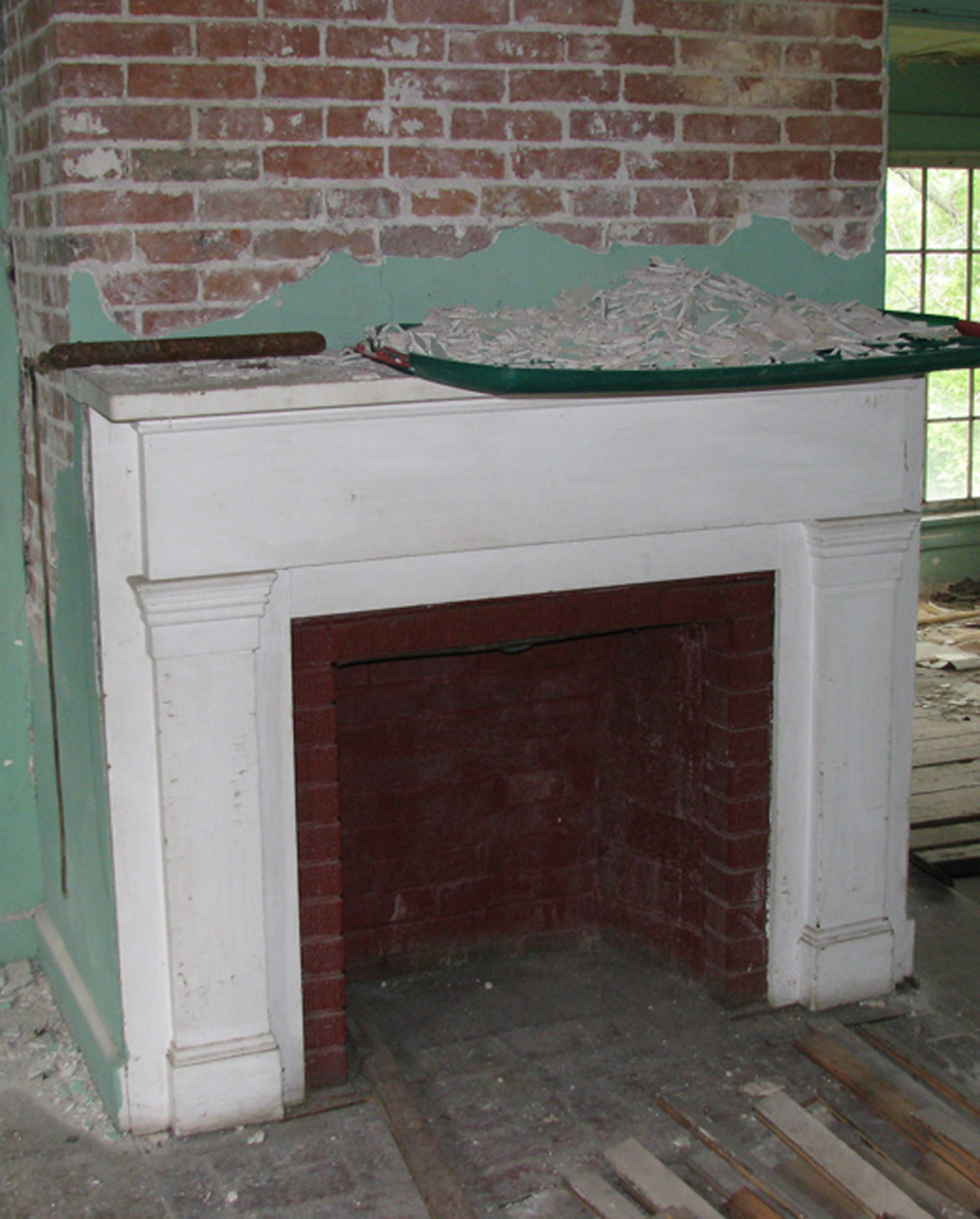 Most likely an original mantel on the second floor in the western room.