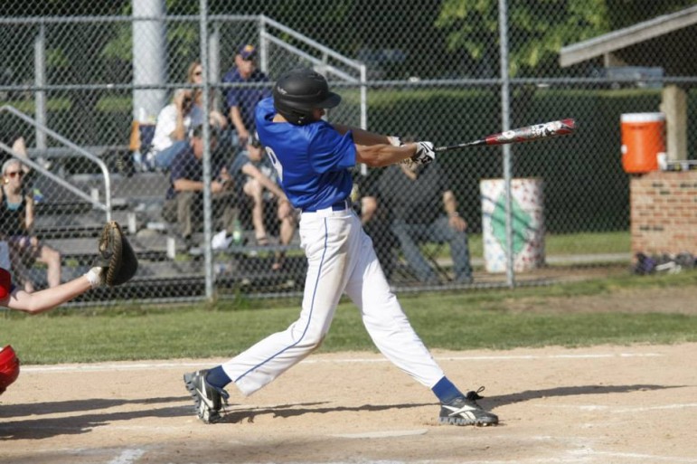 Chris Tronicek swings the bat in last year's district final.
