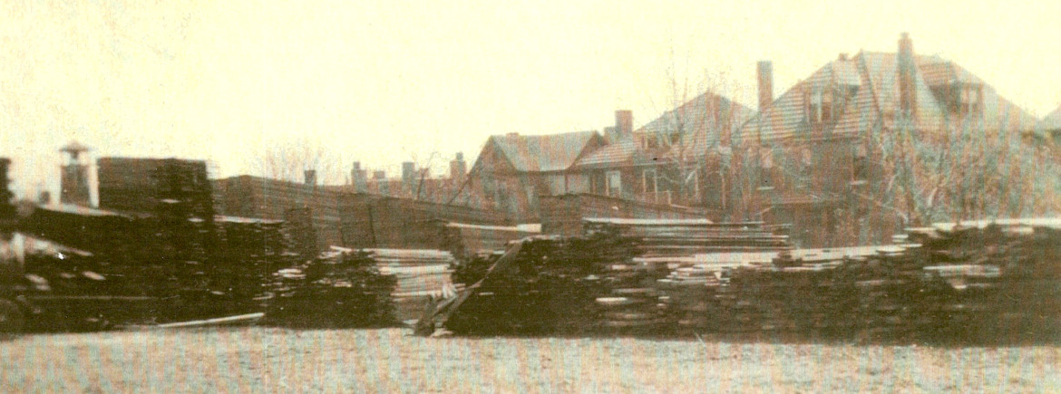 Another view of the lumberyard.  The backs of the homes in the 7400 block of Hazel are visible.