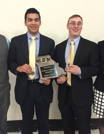 Jonathan Duffe-Holmes and Austin Koster, with a first place plaque earlier this year. 