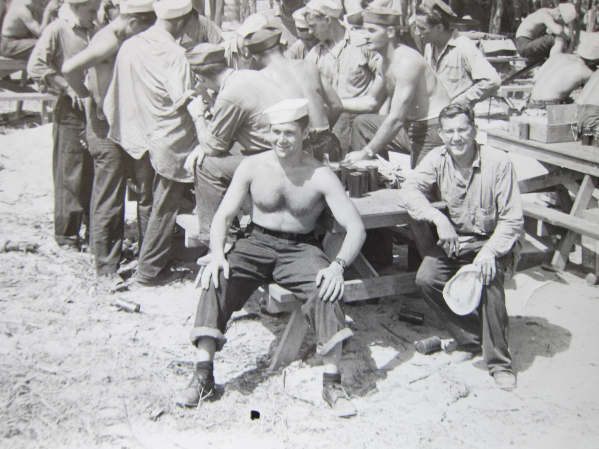 Syl is seated on the right somewhere in the south Pacific during WWII.