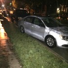 Flooding on Yale Ave. A car was floated onto the curb. Photo by Matt Coriell