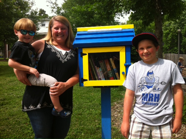 Woman thanks neighbors with a tiny library