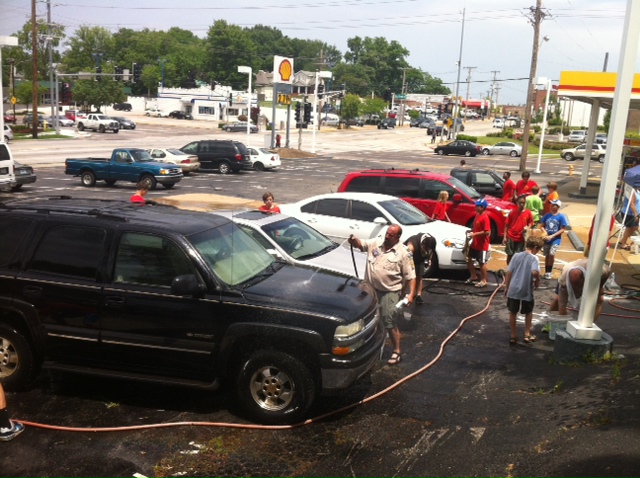 MRH Boy Scout Troop 362 washes cars for new tents.