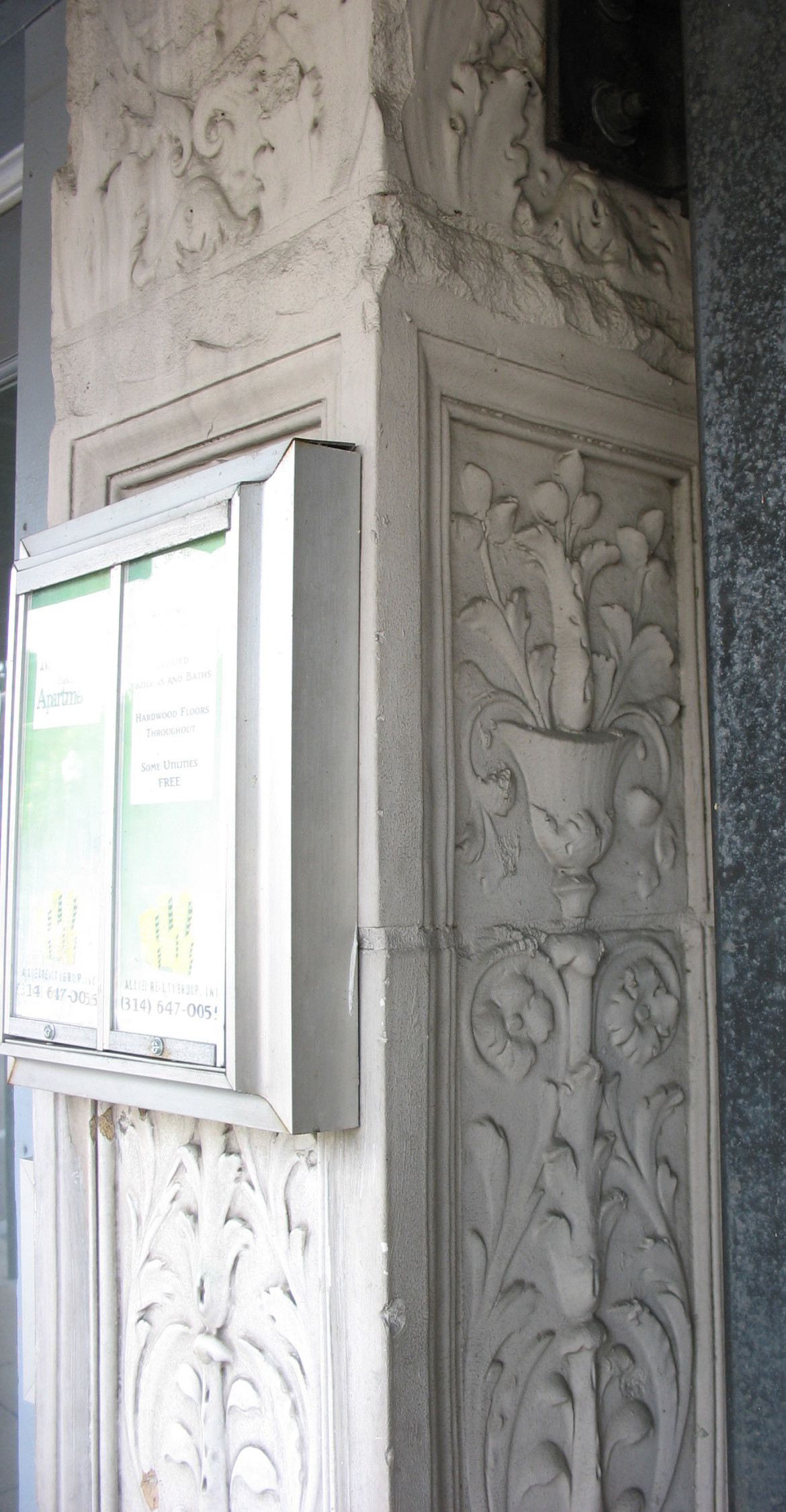 Classically ornamented terra cotta next to the former entrance to the theater.