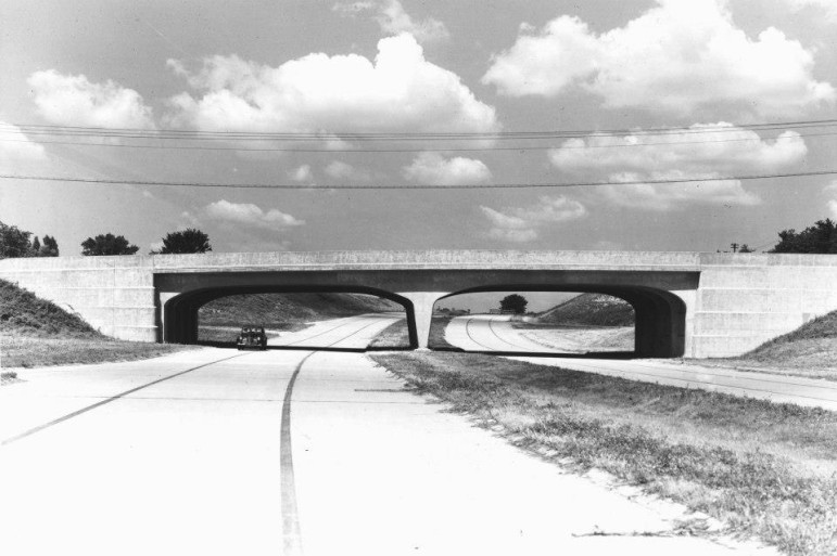 Highway 40/64 looking east, at McKnight Road overpass. The highway ends at the barricades just before Brentwood Blvd. This picture is late 1950's.