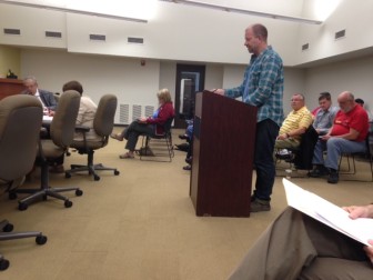 Brian Pelletier, owner of Kakao Chocolate, speaks in favor of the bill, representing the chamber of commerce. 