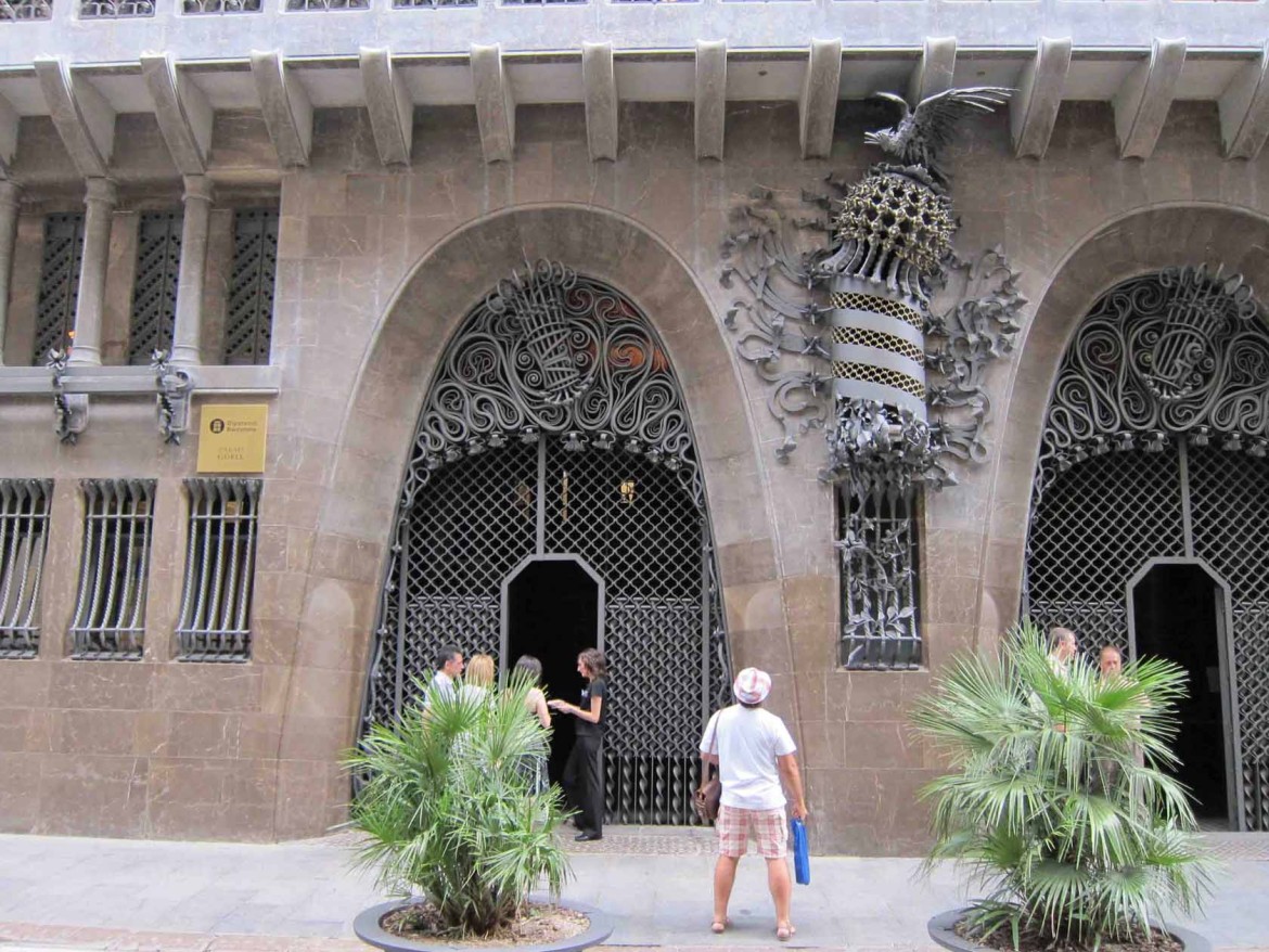 At Palau Guell the main entrances are through two catenary arches. Palau (palace in Catalan) was the primary residence of one of Gaudí's chief patrons, Eusebi Guell. Guell whose fortune came partly from textiles has been referred to as the "Bill Gates" of his day.