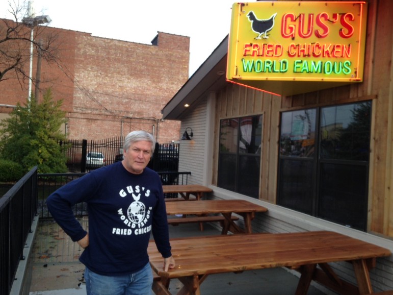 Gus's Fried Chicken owner, Jim Zimmermann, on the patio of his Maplewood restaurant.