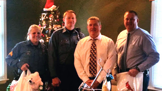Brentwood police officers deliver gifts