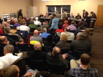Residents and the city council gather for the meeting Tuesday evening.