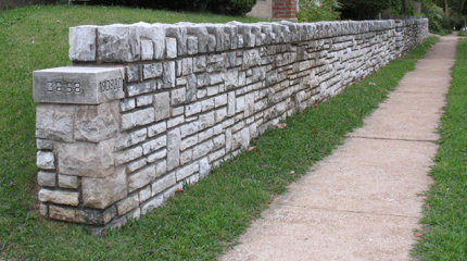 This a sturdy stone wall you might encounter if you take a stroll through the Greenwood neighborhood. Doug Houser photo.