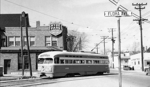 In this photo which I found on a Facebook page called Vintage St. Louis, a streetcar passes in front of a restaurant and bar called Ted's Corner. The beginning of the wall in the previous two photos can be seen at the left.