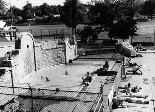 A vintage photo of the stone backdrop to the kiddie pool.