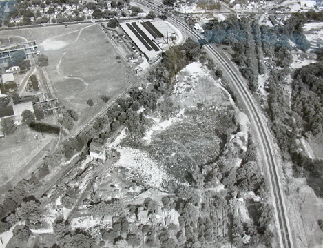 An aerial view of the quarry with Big Bend Road running along the top edge. The factory at the top center is still there. Once Sefton Can Co. it is now owned by Sunnen, I believe. Courtesy of the Maplewood Public Library.