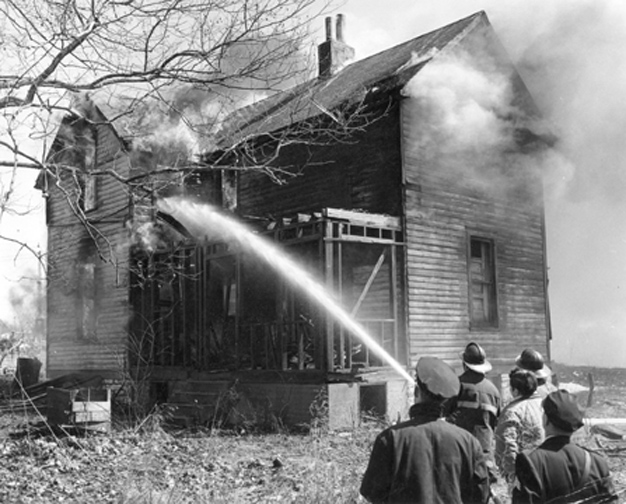 We can't say what happened to all of the homes but we know what happened to this one. Called "a practice burn at Luda and Wall Ave." Courtesy of the Maplewood Public Library.