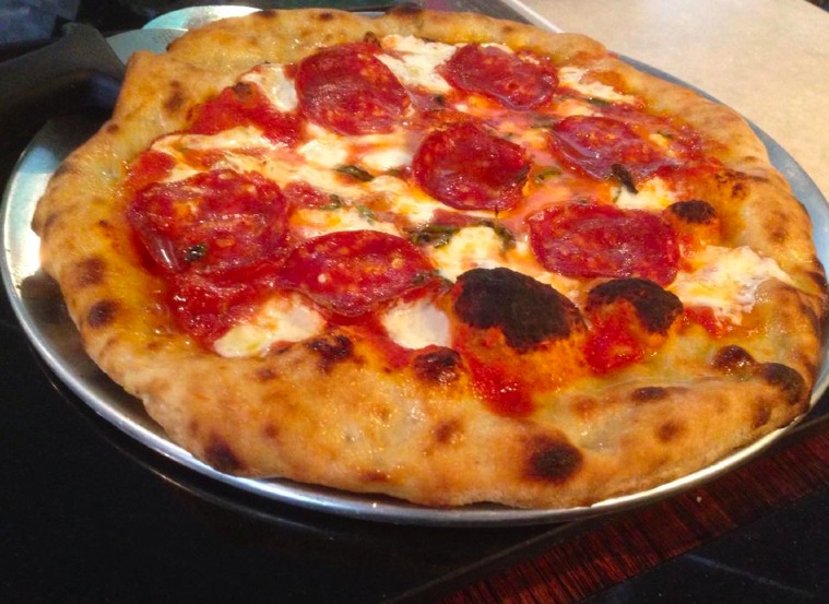 Smitty's Food & Drink will continue to offer wood burning pizza, using the Pizza Story dough formula.
