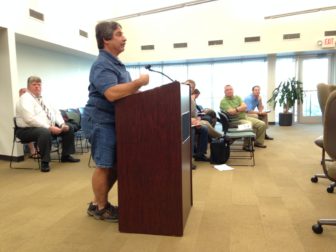Ellis Avenue resident John Hendel tells the board of adjustment his concerns about the proposed Raising Cane's.