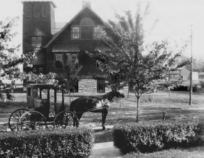 This could be Dr. Cape's rig with the then Congregational church in the background. the location is Hazel at Sutton. the church still exists. this shot was taken in front of Dr. Cape's home which once stood where we have a parking lot today. Courtesy of the Maplewood Public Library.