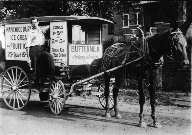 George quick shown here with the Maplewood Dairy's delivery vehicle. Isn't this just a great photo? Courtesy of the Maplewood Public Library.
