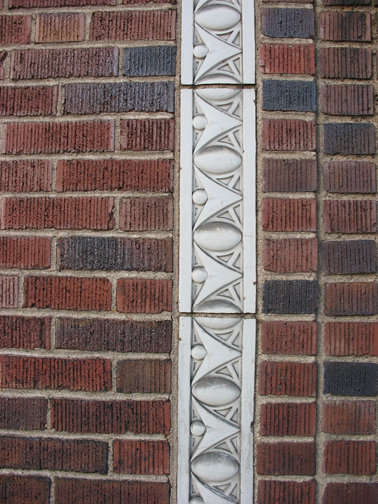 Here is an art Deco example of egg-and-dart molding on a building in the 7100 block of Manchester.
