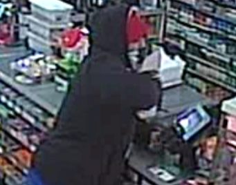 7-Eleven robbed at gunpoint; cops have photos, video